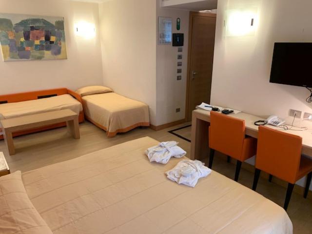 Hotel Villa Doimo Lignano Sabbiadoro Habitación foto