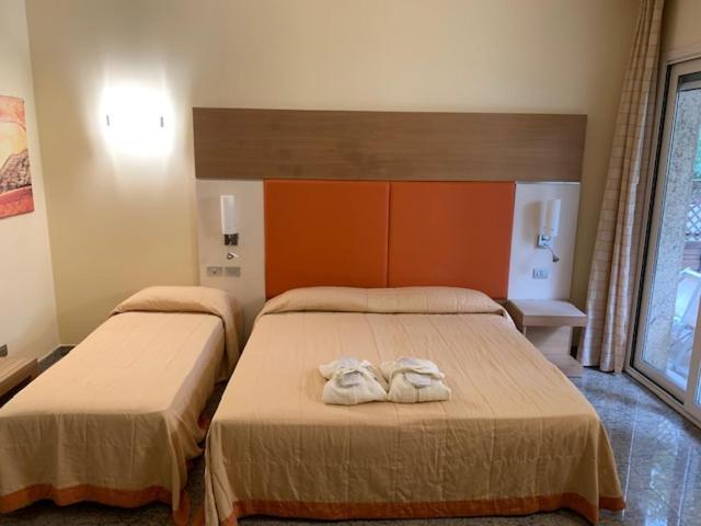 Hotel Villa Doimo Lignano Sabbiadoro Habitación foto