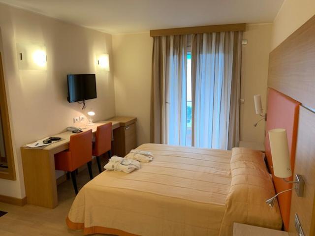 Hotel Villa Doimo Lignano Sabbiadoro Habitación foto